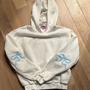 Edikted Cream Hoodie with Light Blue Bow Sleeve Accents